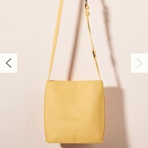 Co-Lab Anthropologie Sloan Vegan Leather Hobo Bucket Bag Pocket Front in Yellow